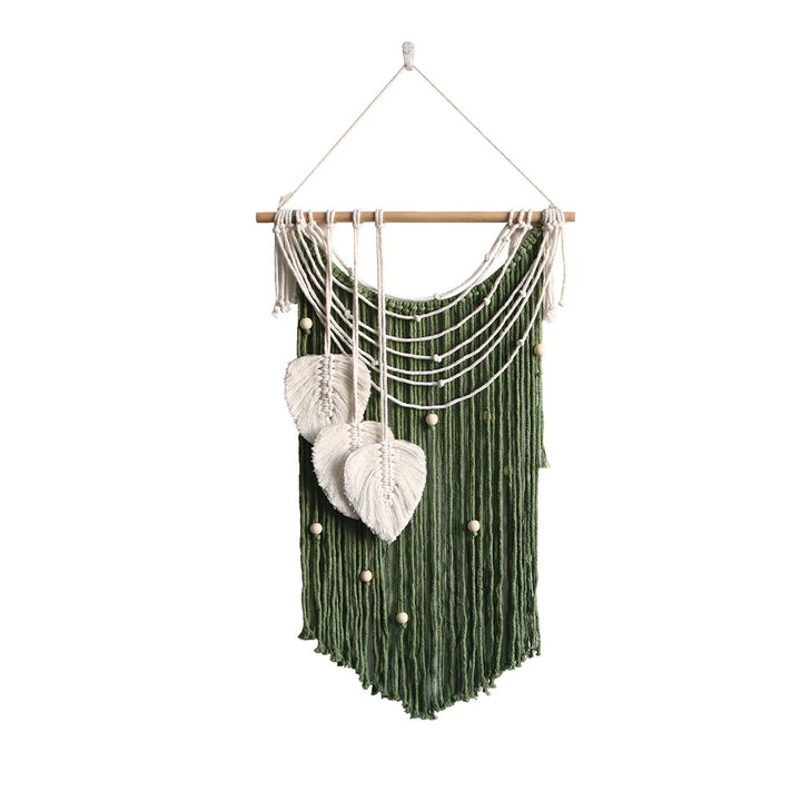 Artistic wall hanging made of macrame with hearts