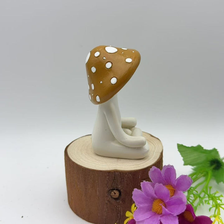 Decorative figure of a meditating mushroom