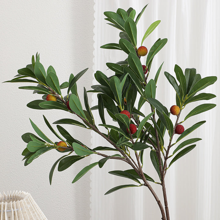 Artificial branch with decorative fruits