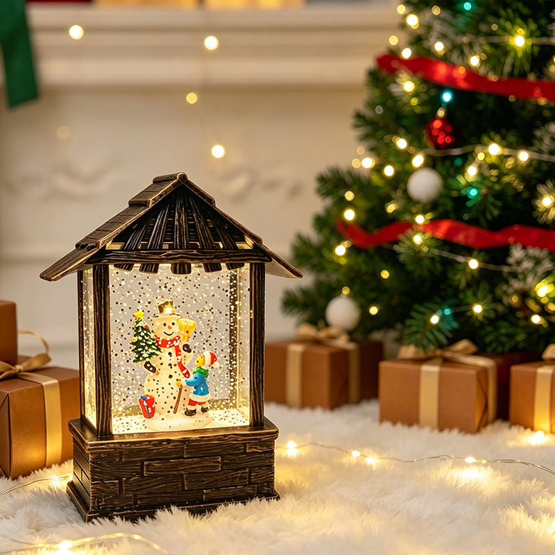 Christmas lantern with snow globe and LED lighting