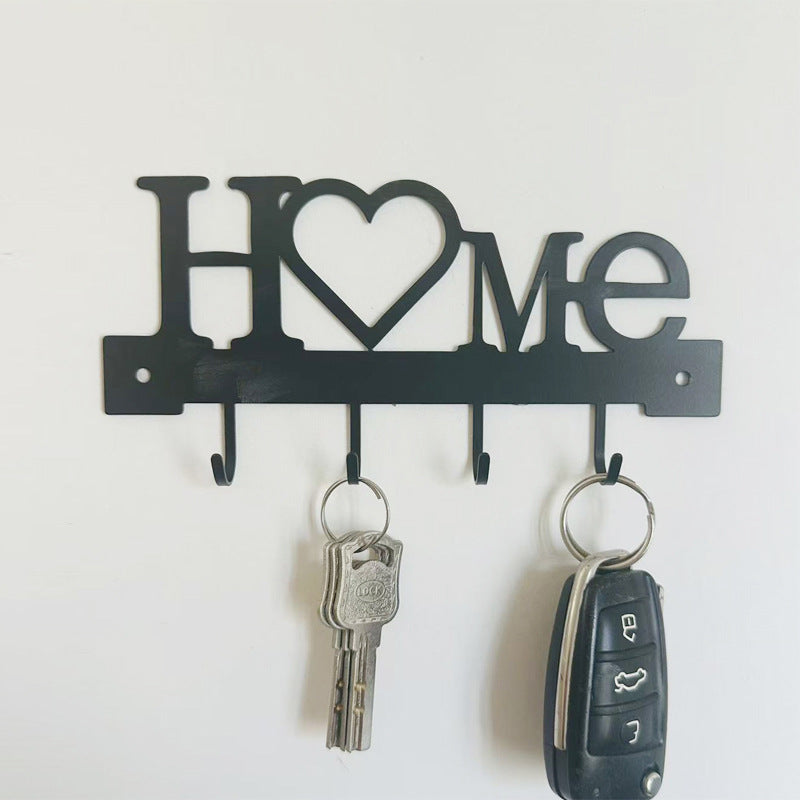 Metal key holder with cat design