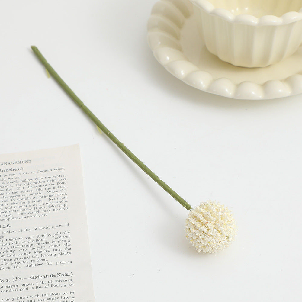 Artificial flower stem with detailed blooms
