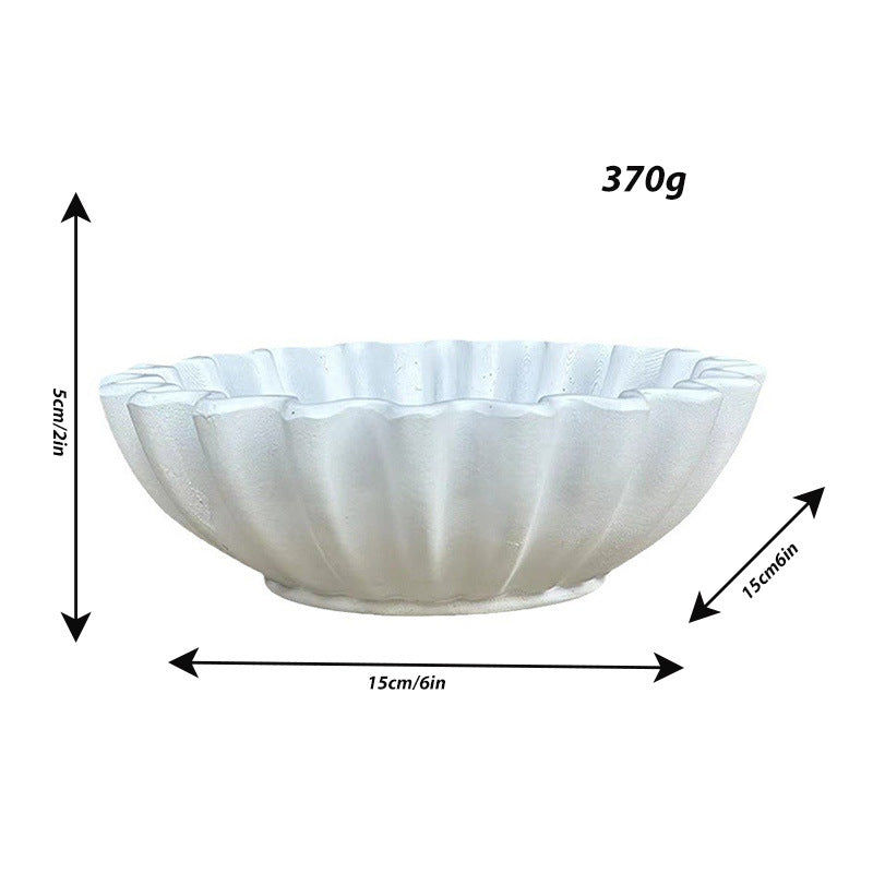 Decorative serving bowl with wave design