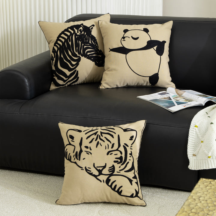 Cotton decorative pillow with raised dog tuft embroidery and contrasting piping