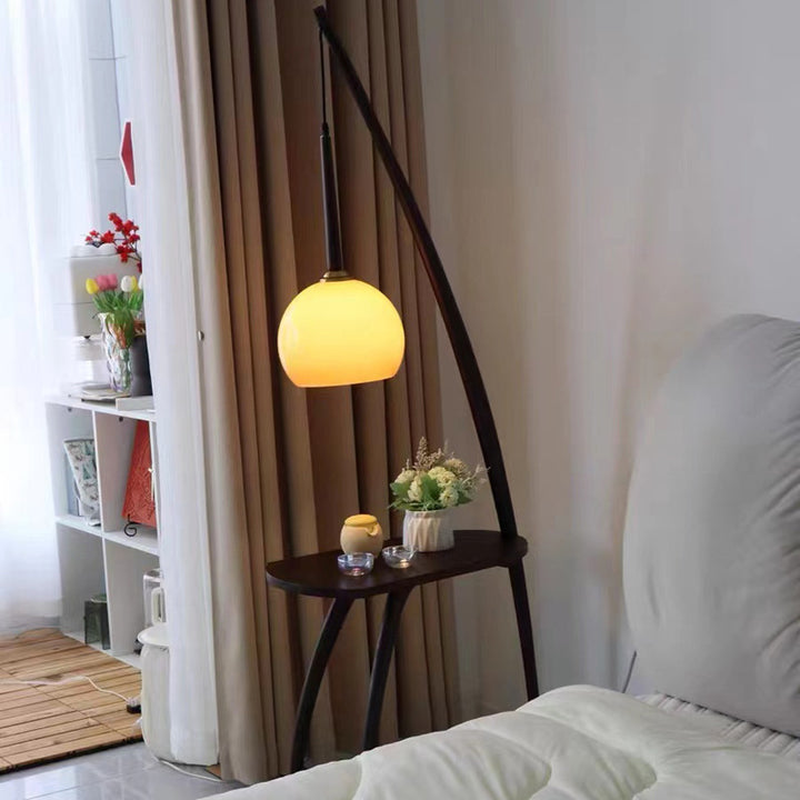Modern floor lamp with integrated side table