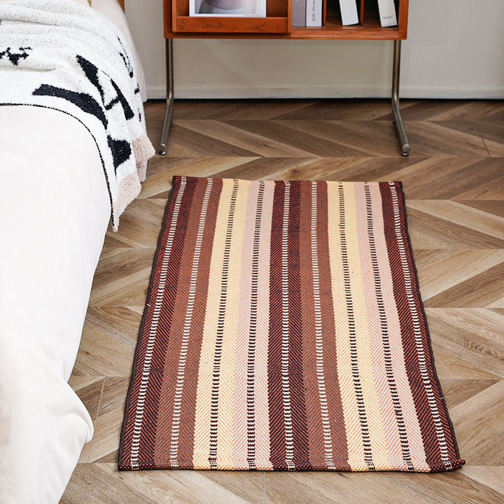 Flat-woven runner rug with check pattern and decorative border stripe