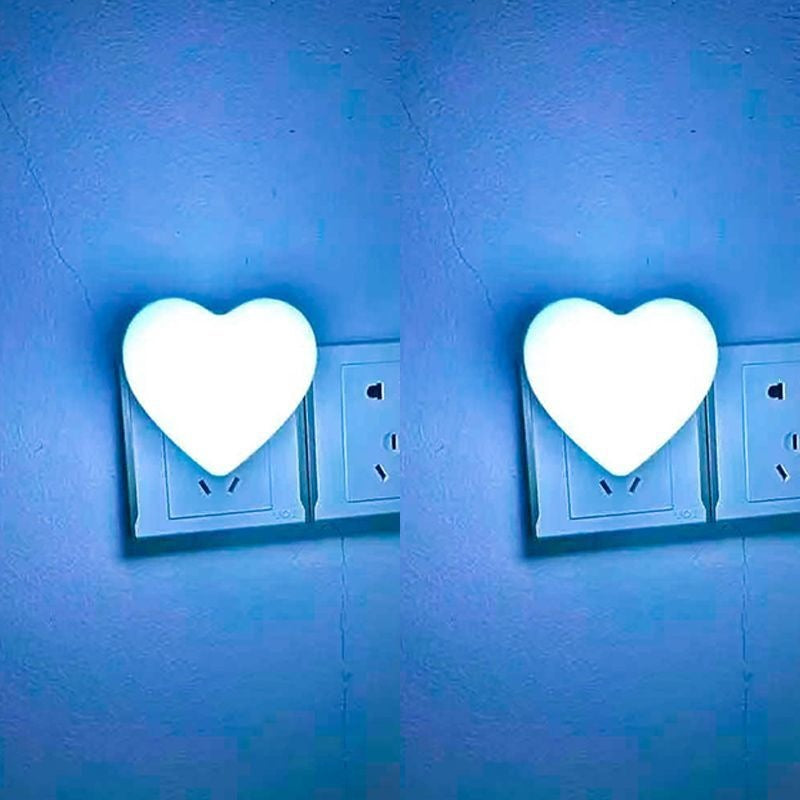 Heart-shaped plug-in ambient night light with soft LED lighting