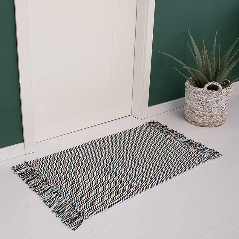 Flat-woven cotton rug runner with geometric check pattern and easy-care surface