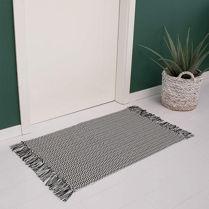 Flat-woven cotton rug runner with geometric check pattern and easy-care surface