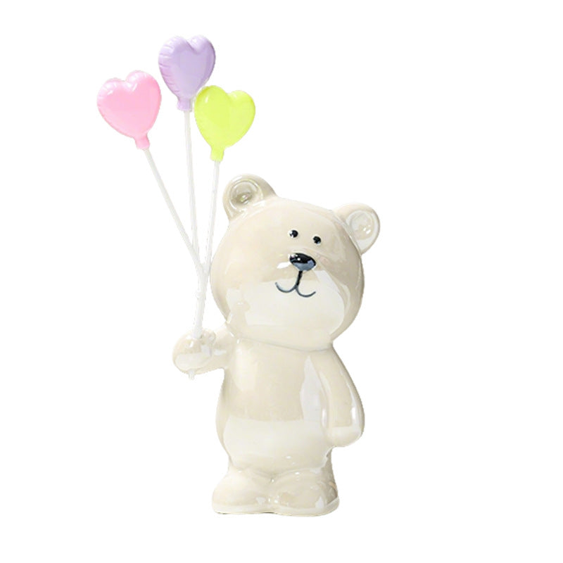 Cute ceramic bear figurine with balloons