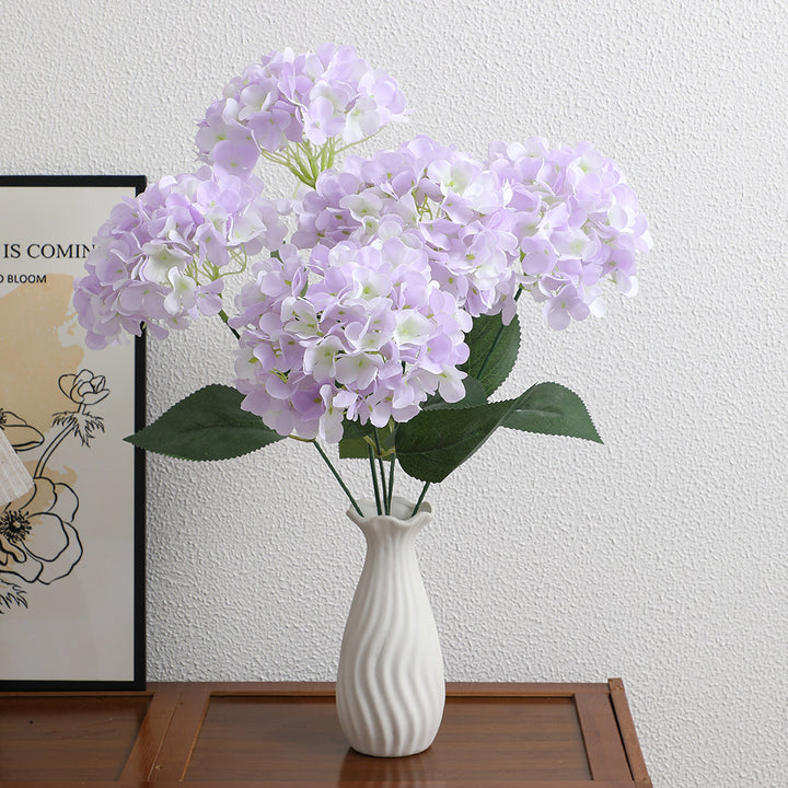 Decorative artificial flower arrangement