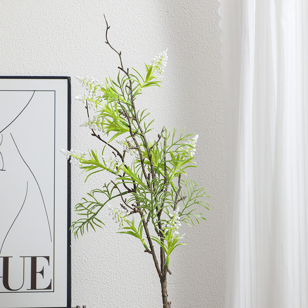Artificial plant with decorative flowers