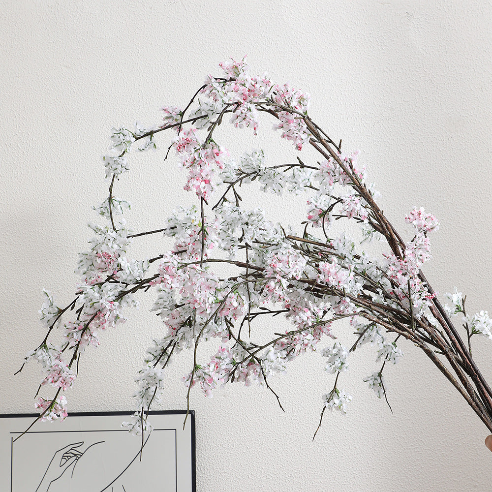 Artificial cherry blossom branch with lifelike details