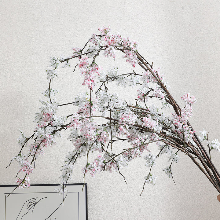 Artificial cherry blossom branch with lifelike details