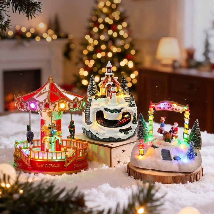 Illuminated Christmas village decoration with moving figures