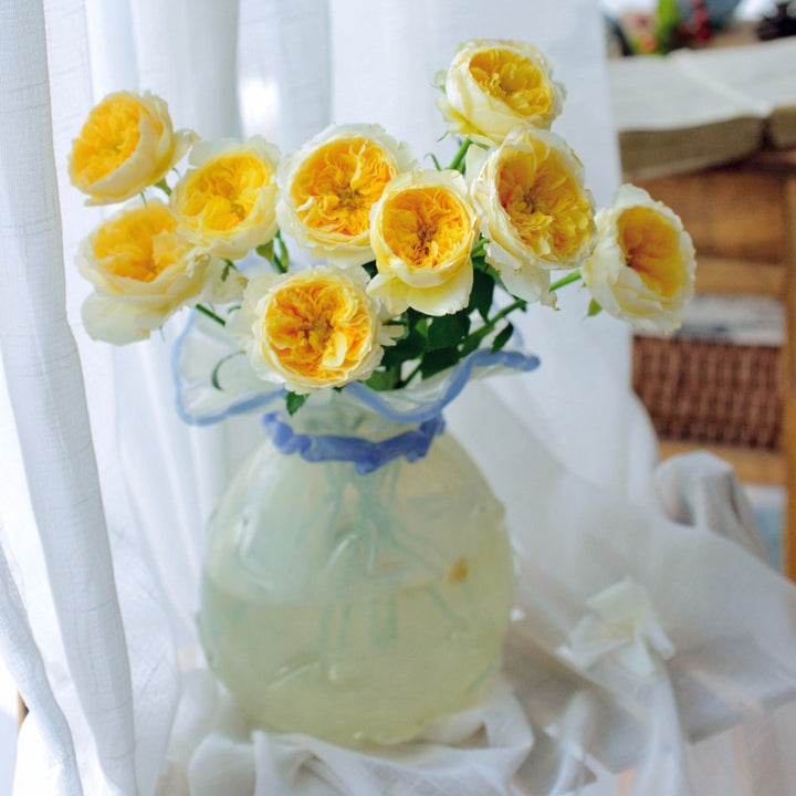 Ruffled-Rim Hand-Blown Decorative Glass Vase with Twisted Neck Accent