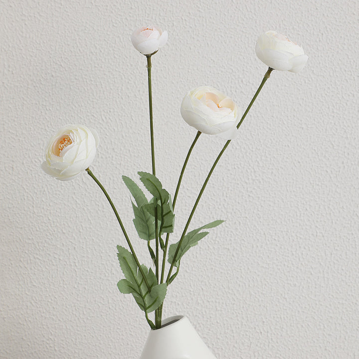 Decorative artificial flower bouquet with intricately detailed ranunculus