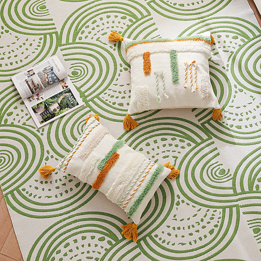 Decorative cotton cushion with hand-tufted relief and decorative tassels