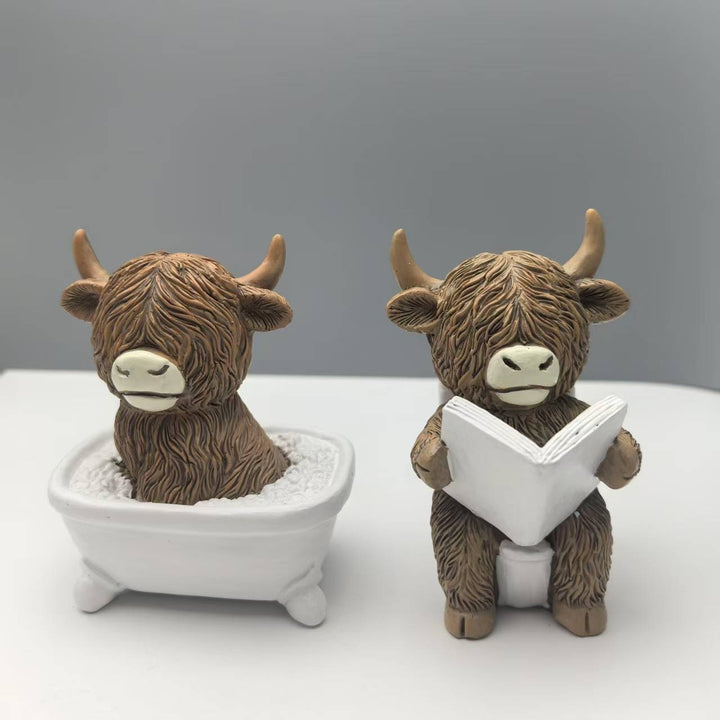 Funny decorative figure of a Highland cow in a bathtub