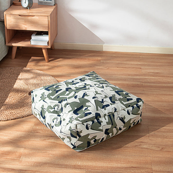 Quilted floor cushion with removable cover and camouflage pattern