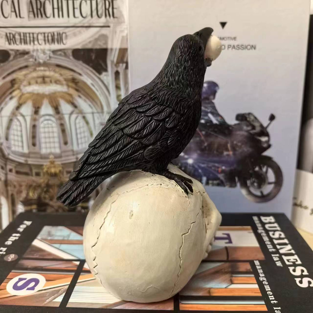 Decorative figure with raven on skull