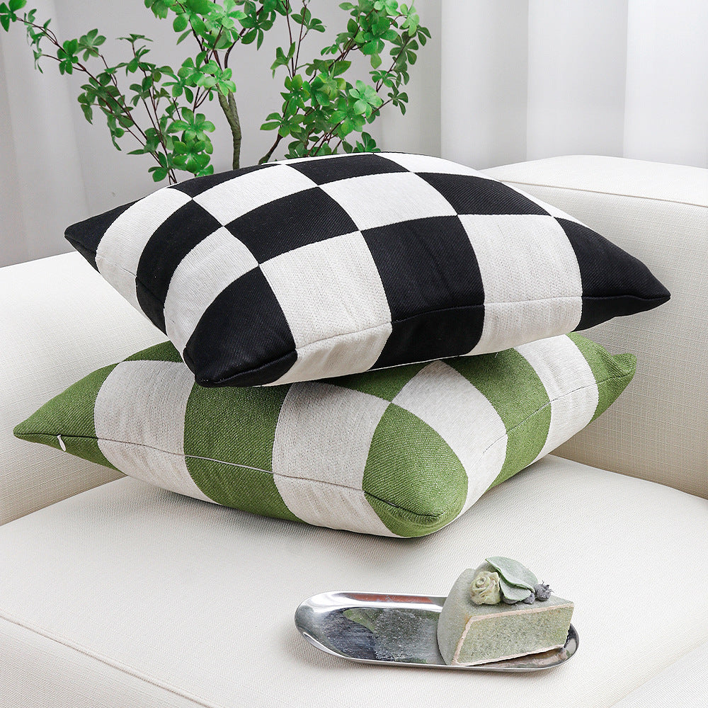 Square decorative cushion with woven checkered pattern and hidden zipper