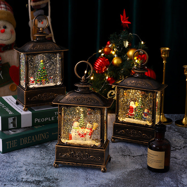 Glittering Christmas lantern with snow scenes