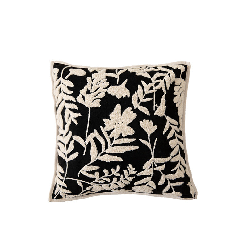 Decorative cushion cover with floral flock application