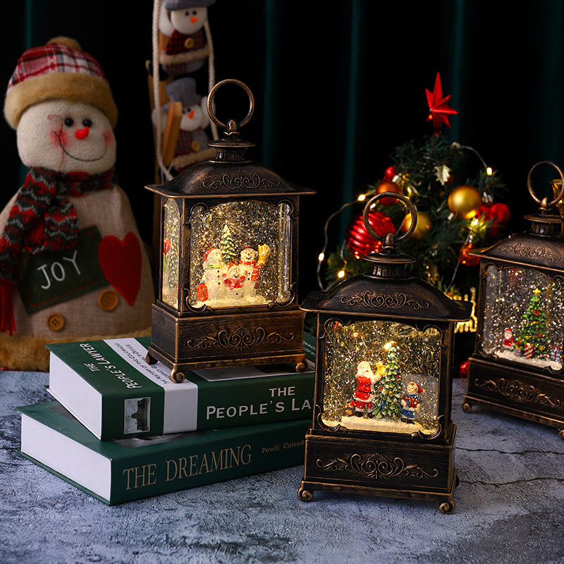 Glittering Christmas lantern with snow scenes