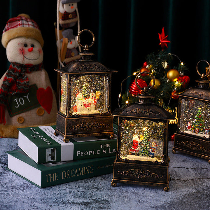 Glittering Christmas lantern with snow scenes