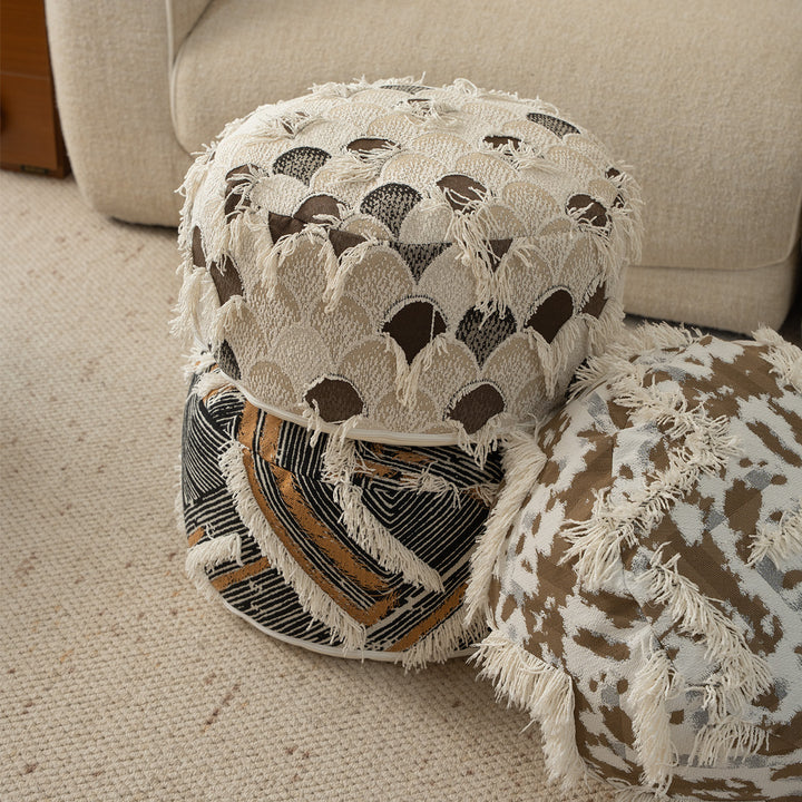 Beef woven seat pouf with boho tassels and textured tufted surface