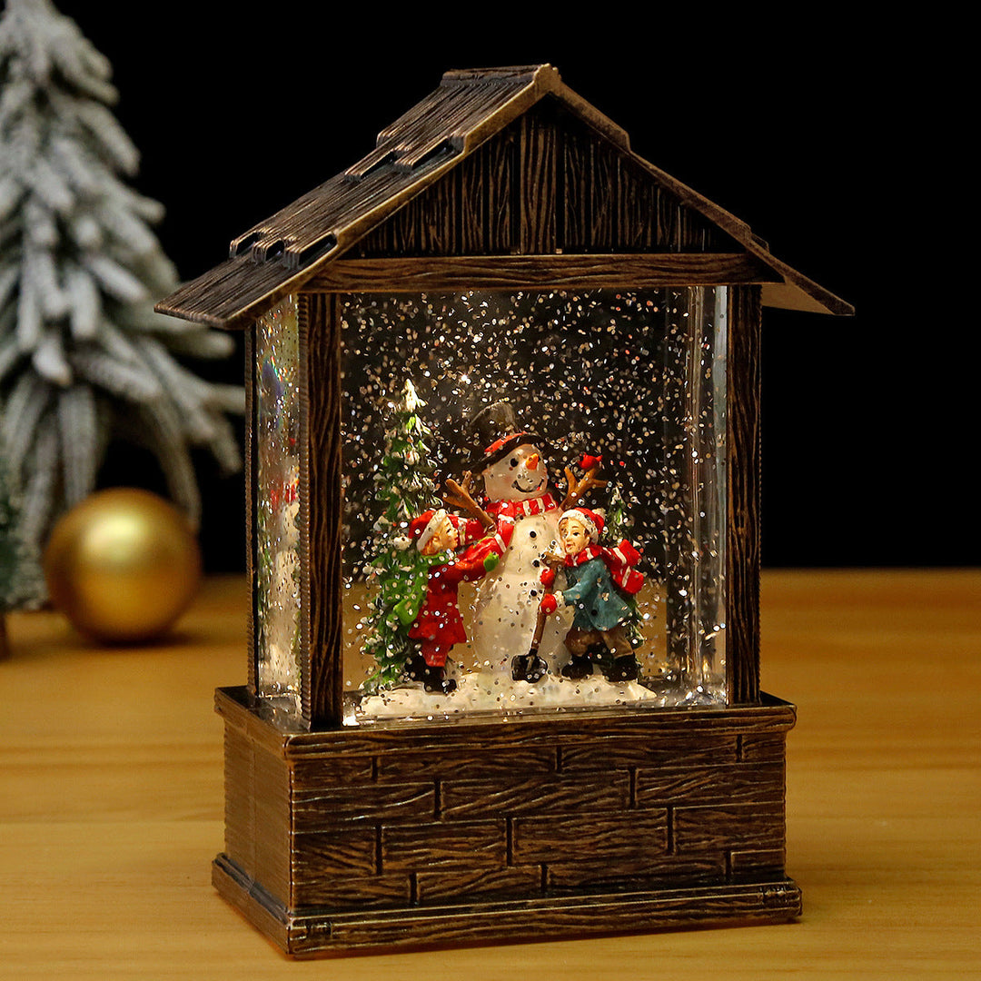 Nostalgic snow globe decoration with Santa Claus and children