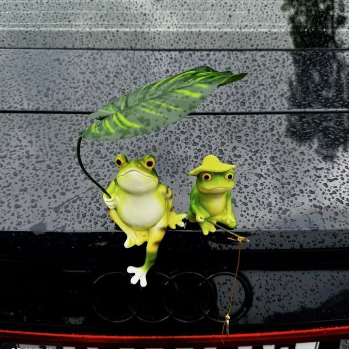 Funny frog figure with umbrella