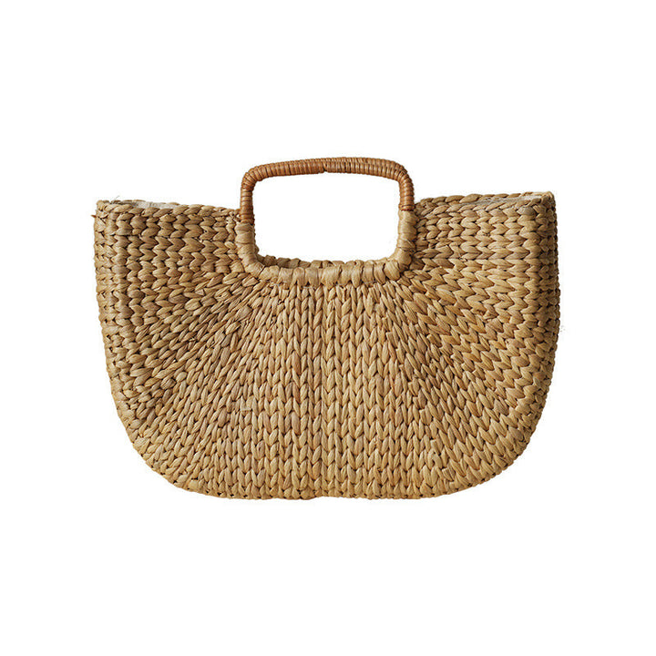 Handmade beach bag made of braided rattan