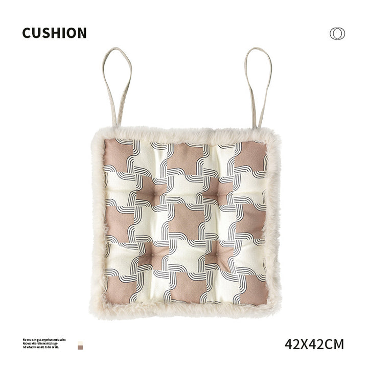 Padded seat cushion with fastening straps, quilted tufting surface and faux fur trim