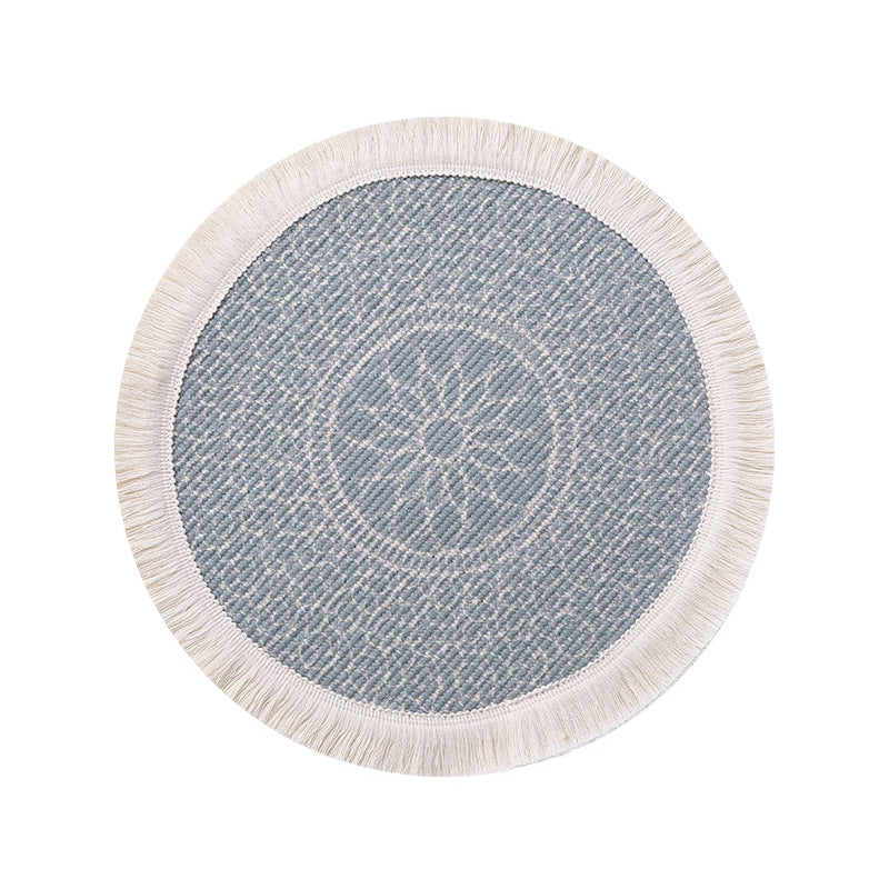 Round woven placemat with fringes and mandala jacquard structure