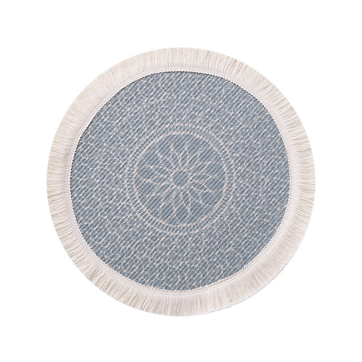 Round woven placemat with fringes and mandala jacquard structure