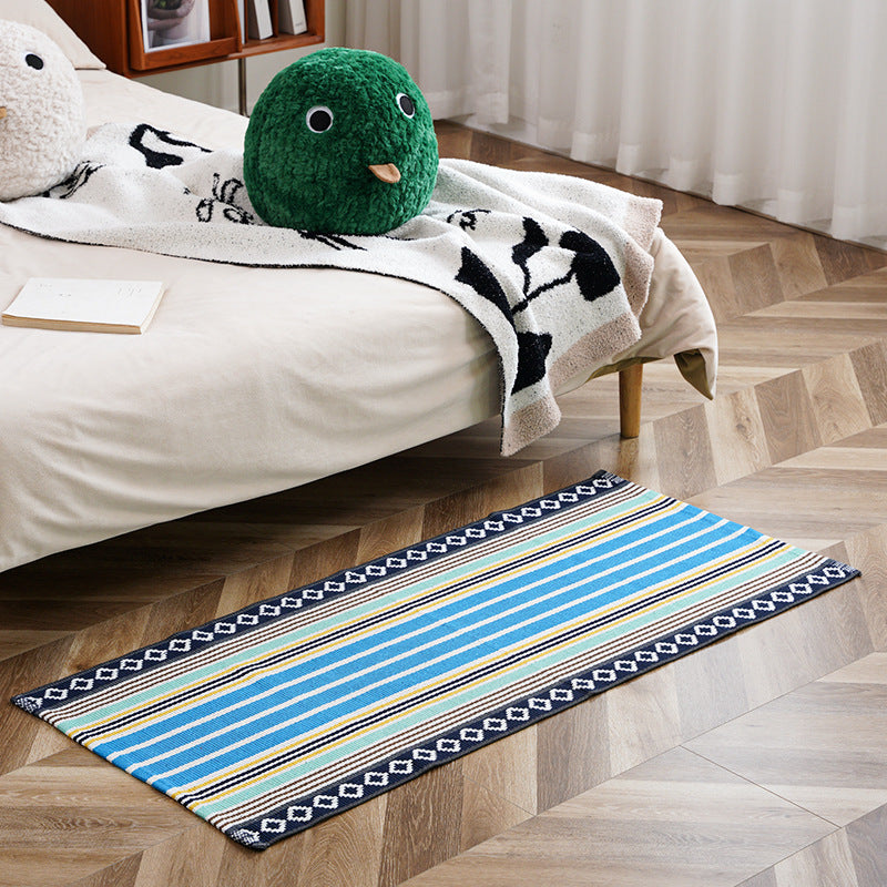 Flat-woven runner rug with check pattern and decorative border stripe