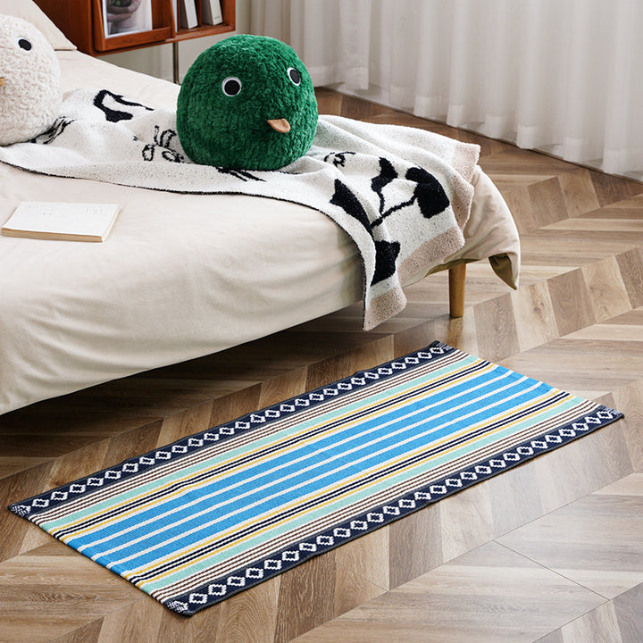Flat-woven runner rug with check pattern and decorative border stripe