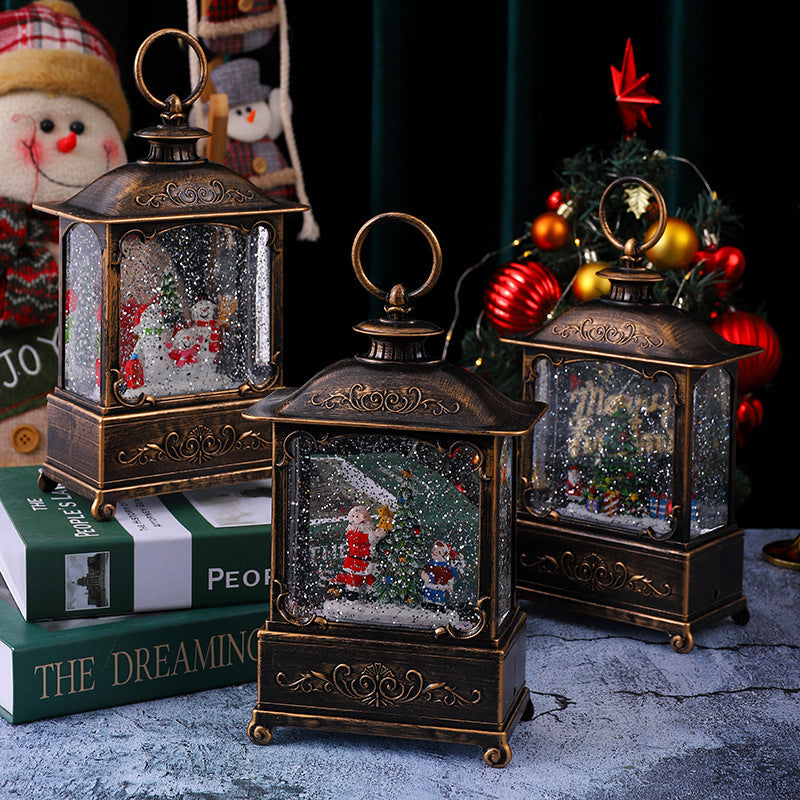 Glittering Christmas lantern with snow scenes
