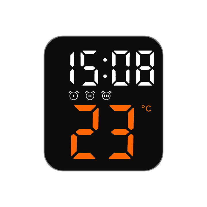 Digital radio alarm clock with temperature and hygrometer display