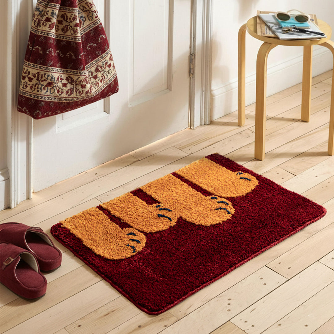 Fluffy bathroom doormat with paw relief