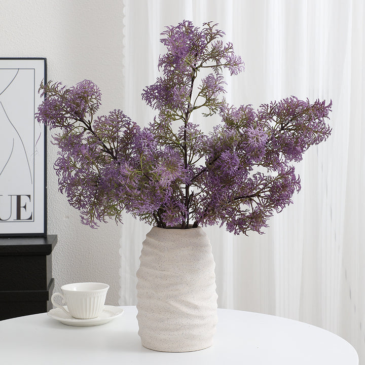 Artificial flower branch with delicate purple flowers