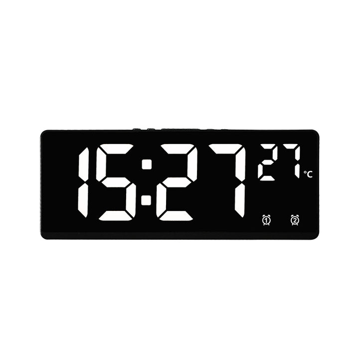 Digital alarm clock with mirror display and temperature function