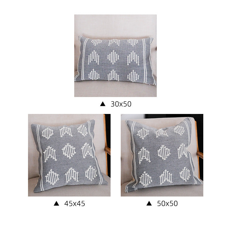 Woven decorative cushion cover with hand-tufted geometric pattern
