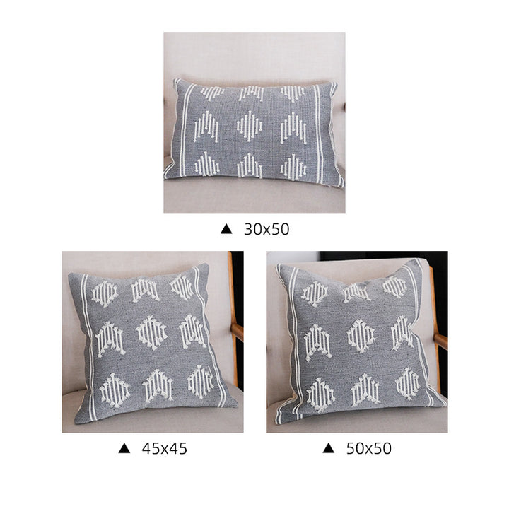 Woven decorative cushion cover with hand-tufted geometric pattern