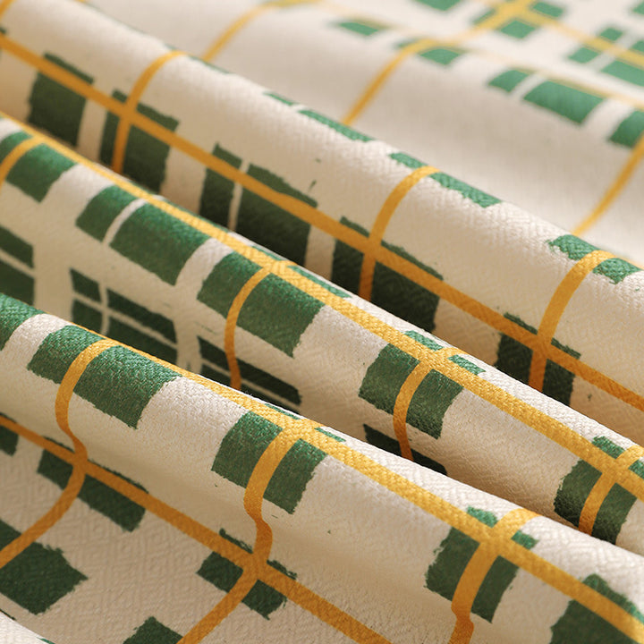 Light cotton-linen tablecloth with checked grid pattern and easy-care surface