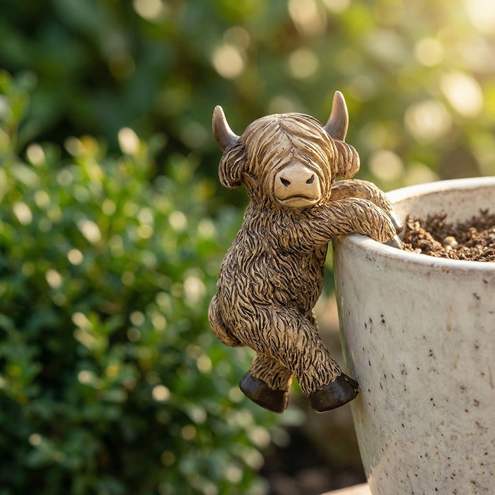 Playful Highland Cow Figurine