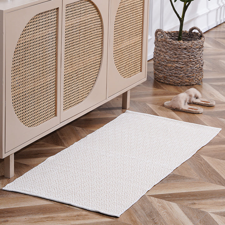 Flat-woven runner rug with check pattern and decorative border stripe