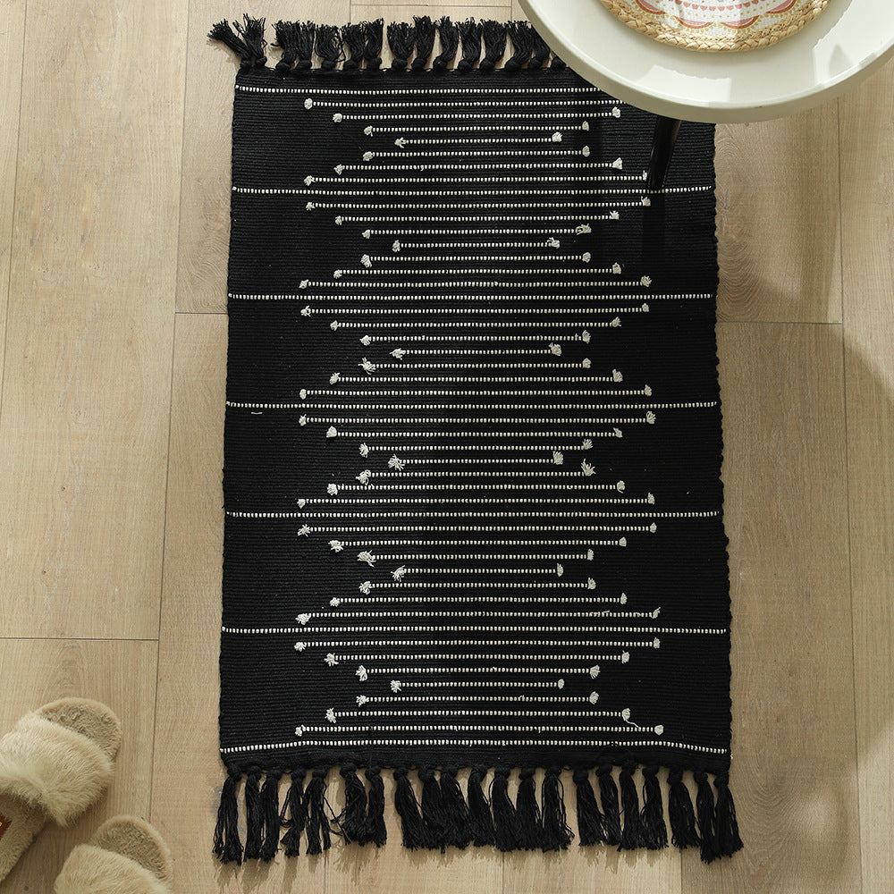 Cotton runner rug with fringes and geometric texture pattern